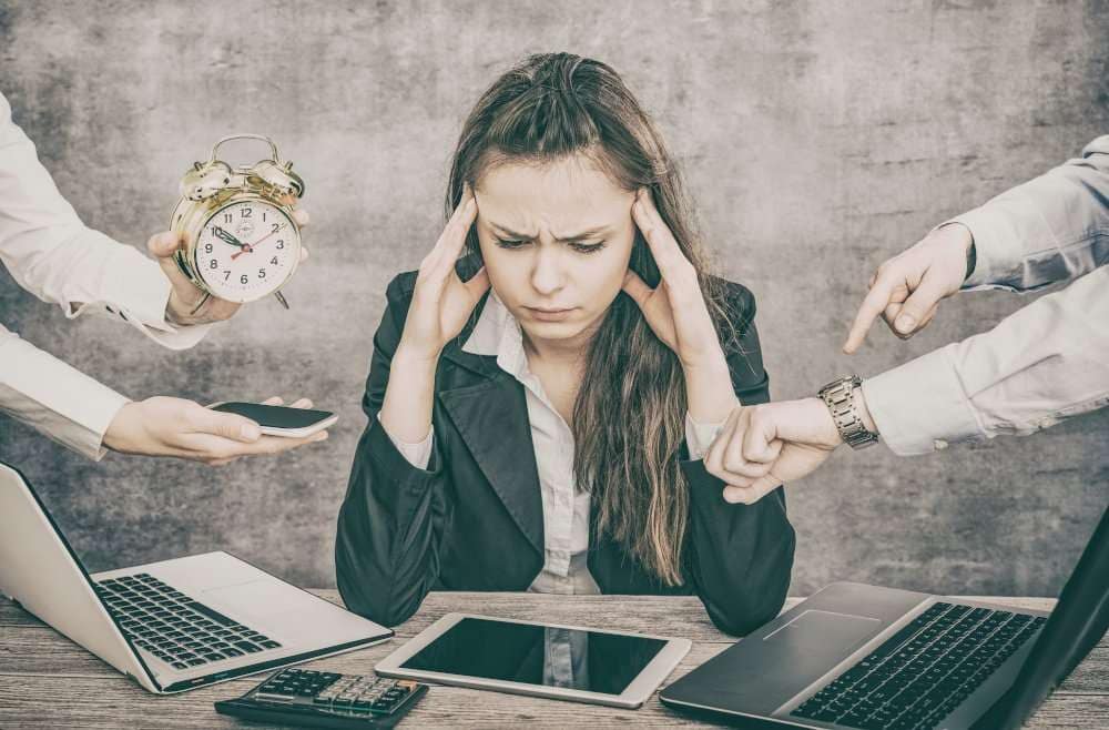 Female office worker is tired of work and exhausted.