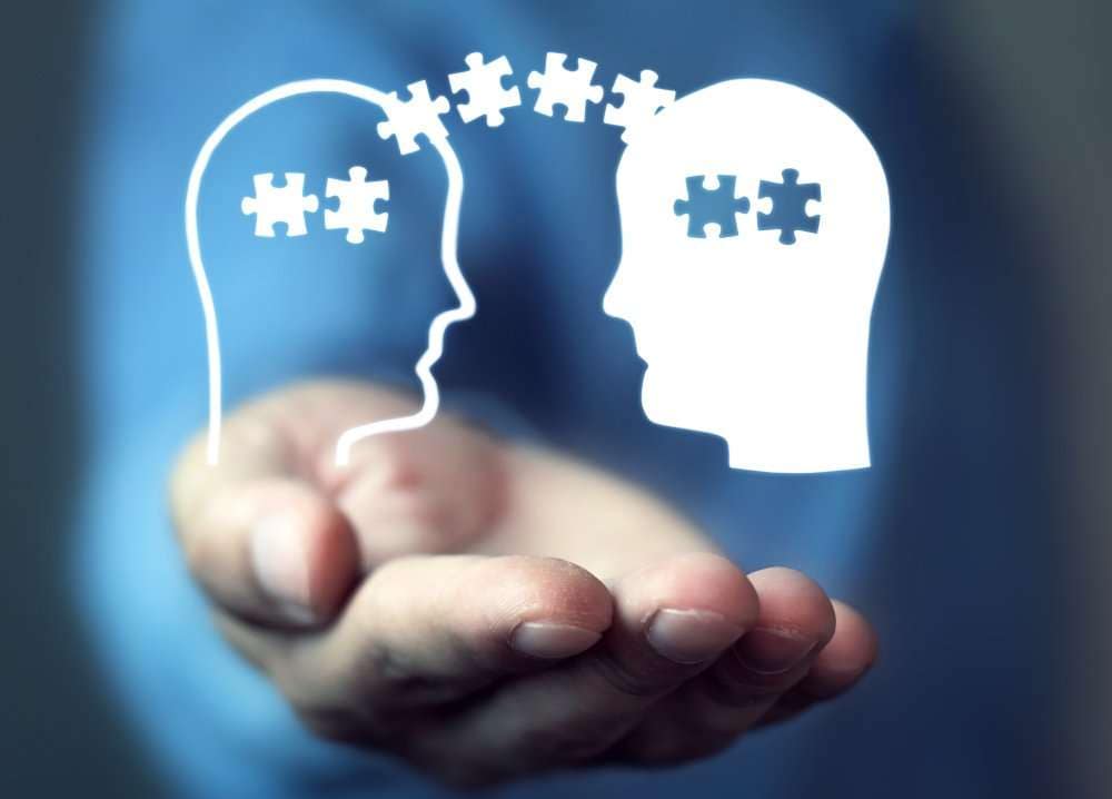 Graphic of two minds sharing information to illustrate legal collaboration