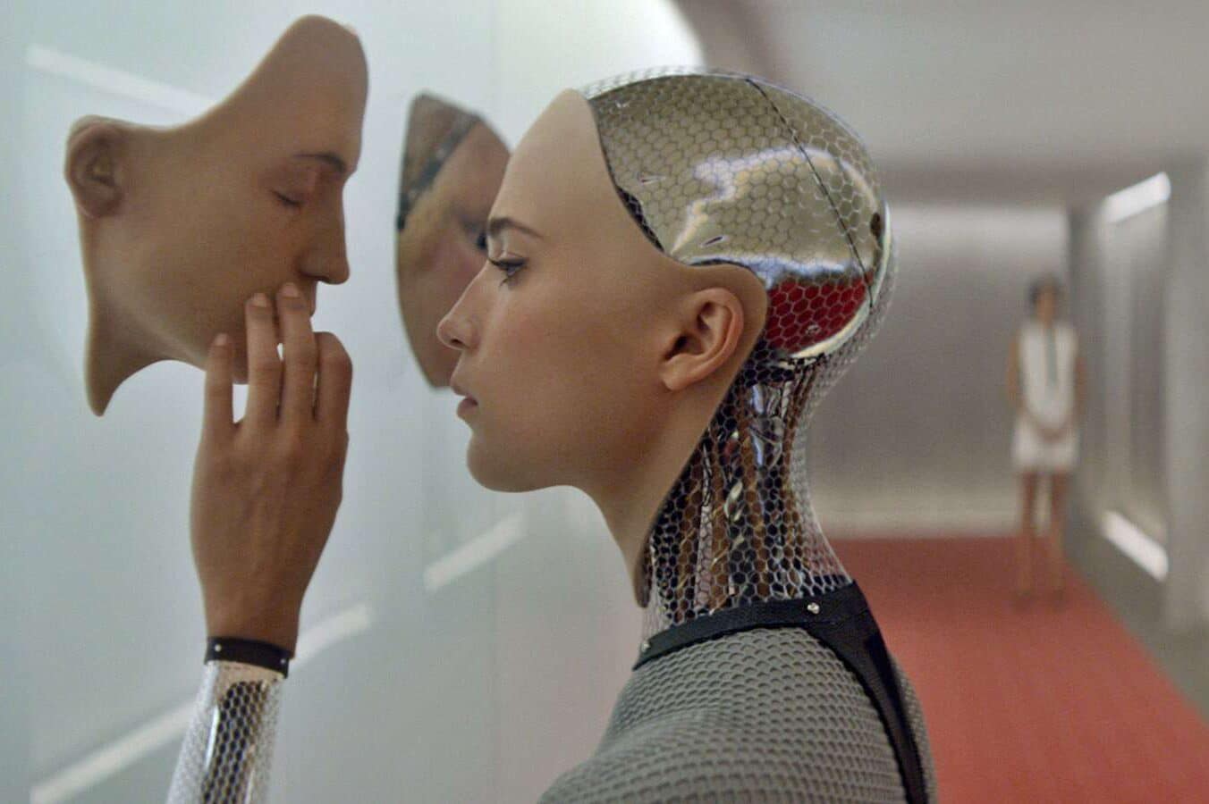 advanced ai model touching a synthetic face mounted on a wall