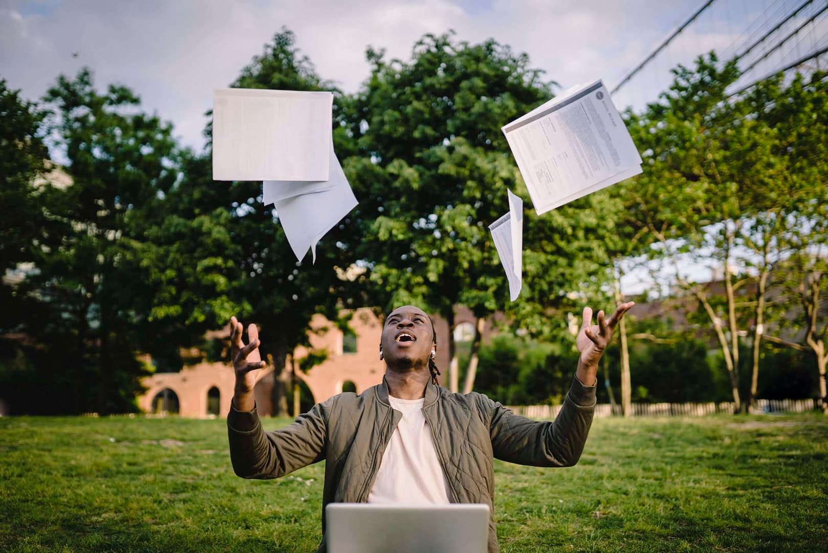 man throwing pdf types into the air